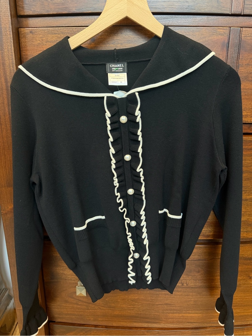 CHANEL Black Knit Cardigan with White Trim and Pearl Buttons